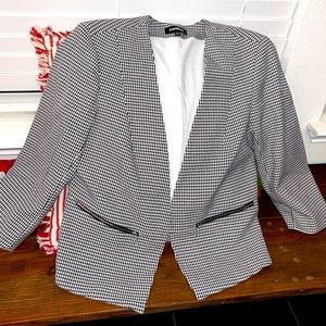 White and black blazer